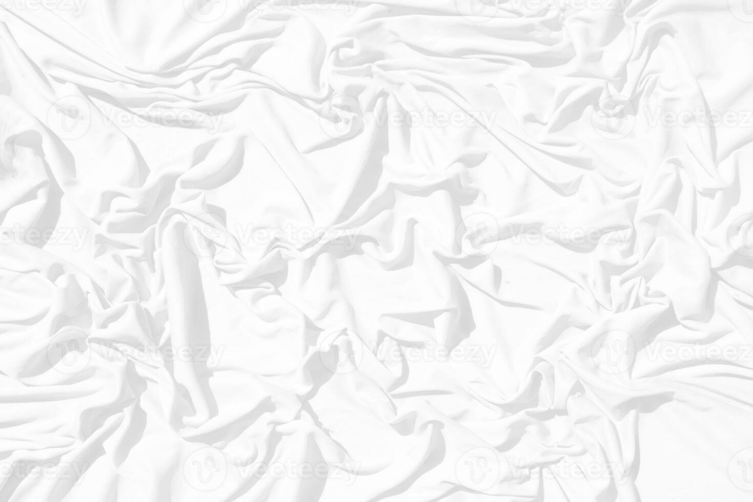 Top view Abstract White cloth background with soft waves.Wave and curve overlapping with different shadow of color,white fabric, crumpled fabric. photo