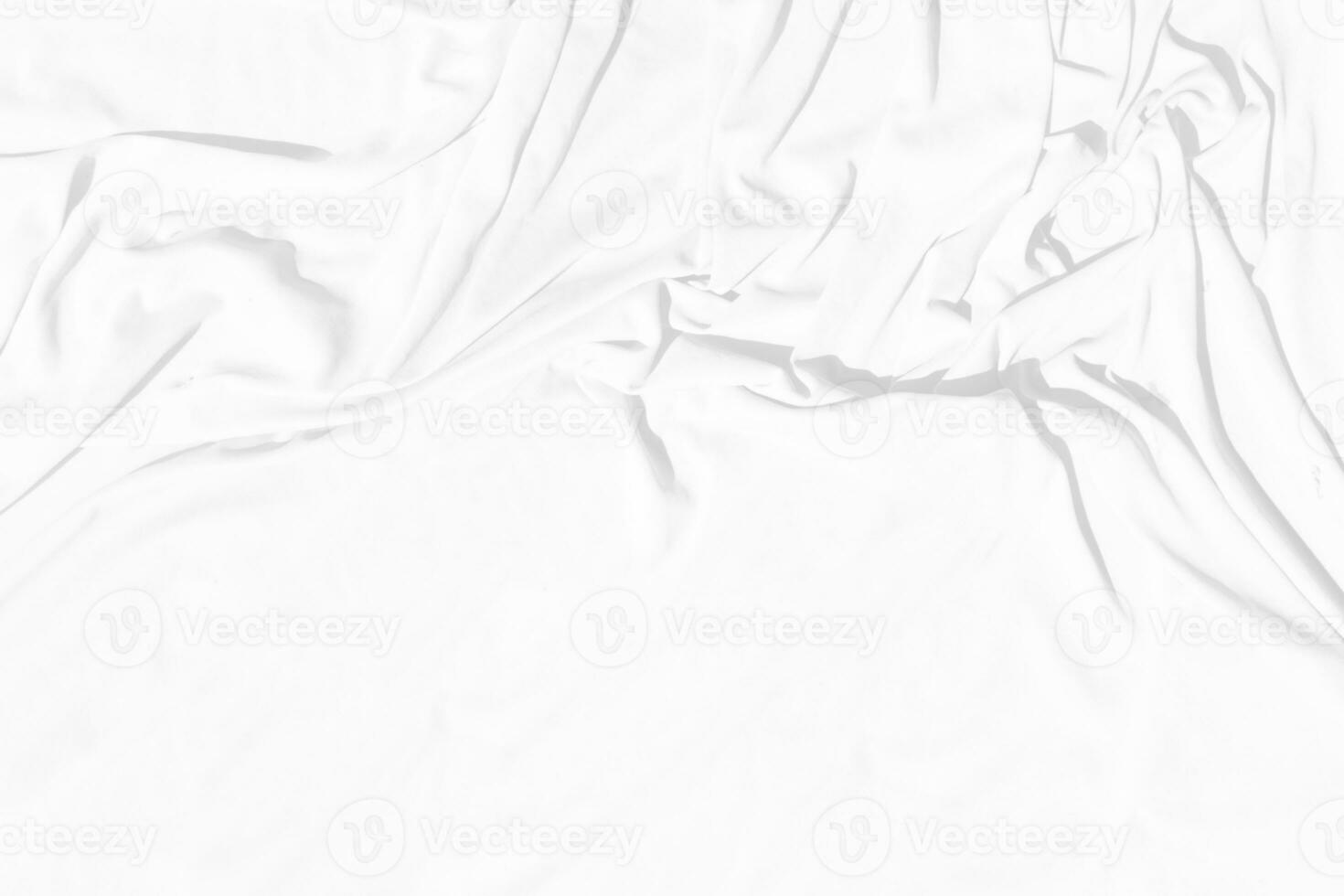 Top view Abstract White cloth background with soft waves.Wave and curve overlapping with different shadow of color,white fabric, crumpled fabric. photo