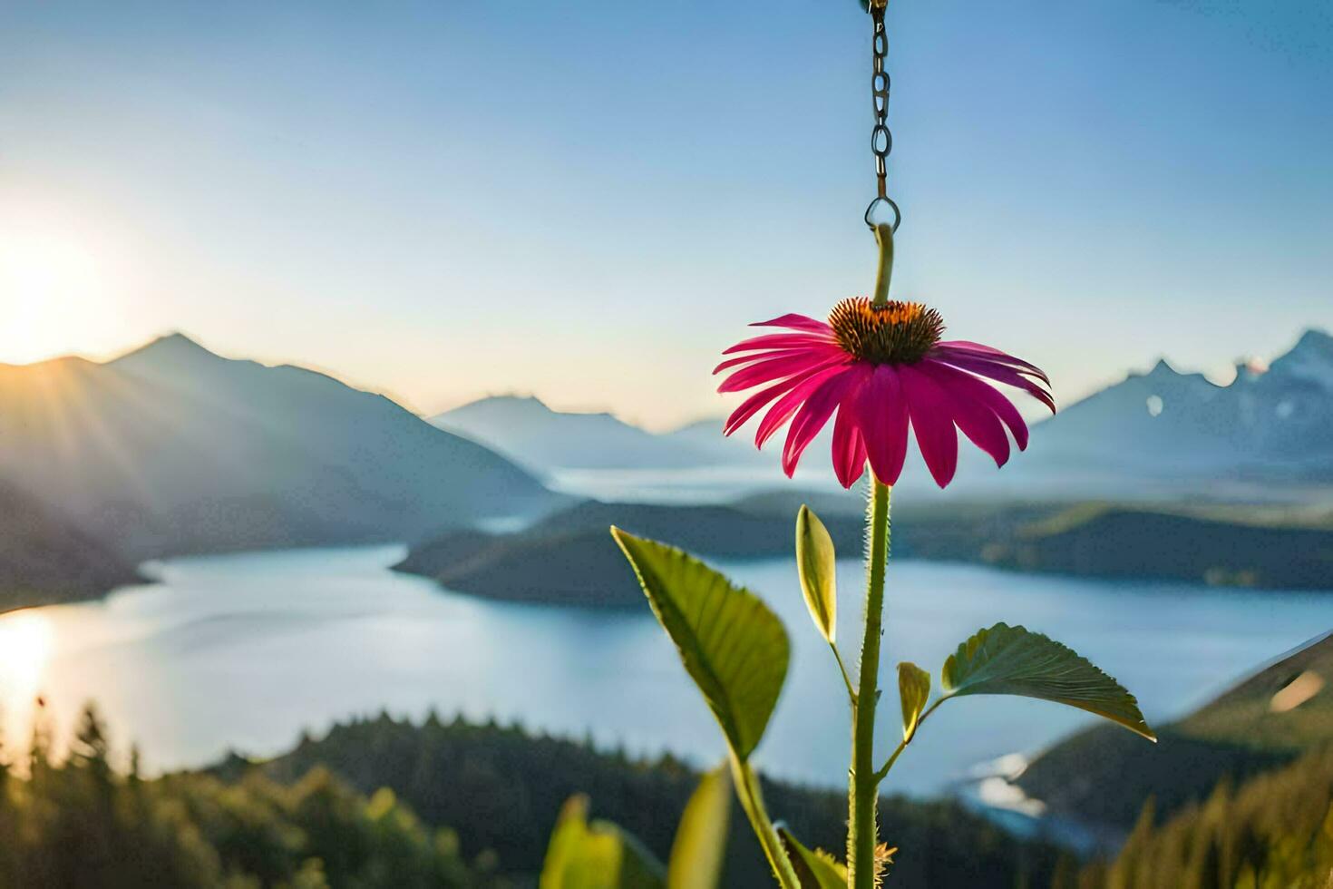 a pink flower is hanging from a chain in front of a lake and mountains. AI-Generated photo