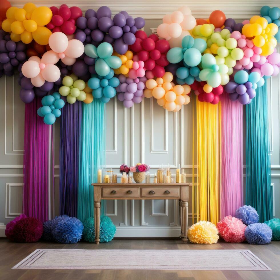 Vibrant rainbow balloon backdrop with tassels photo