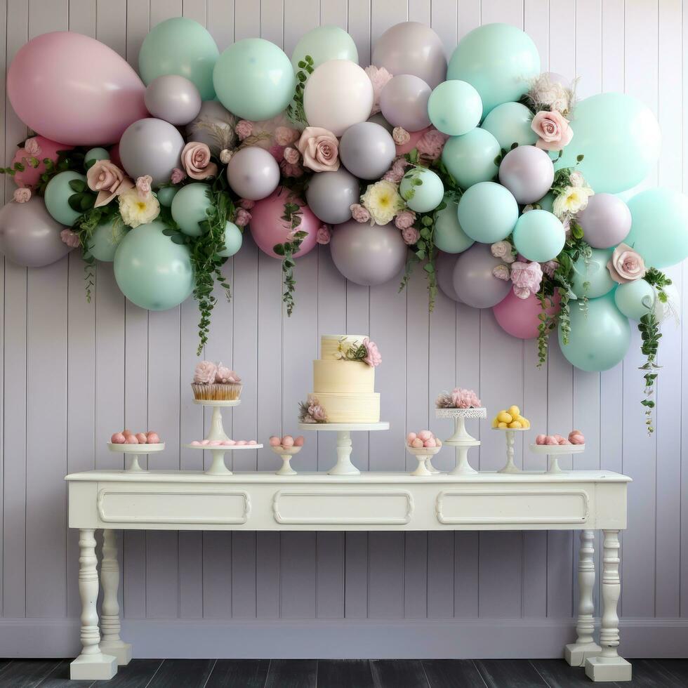 Pastel balloon garland with flowers and greenery photo