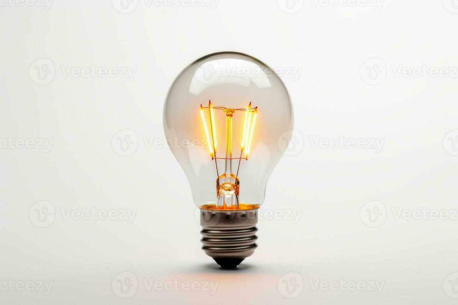 a lit light bulb photo