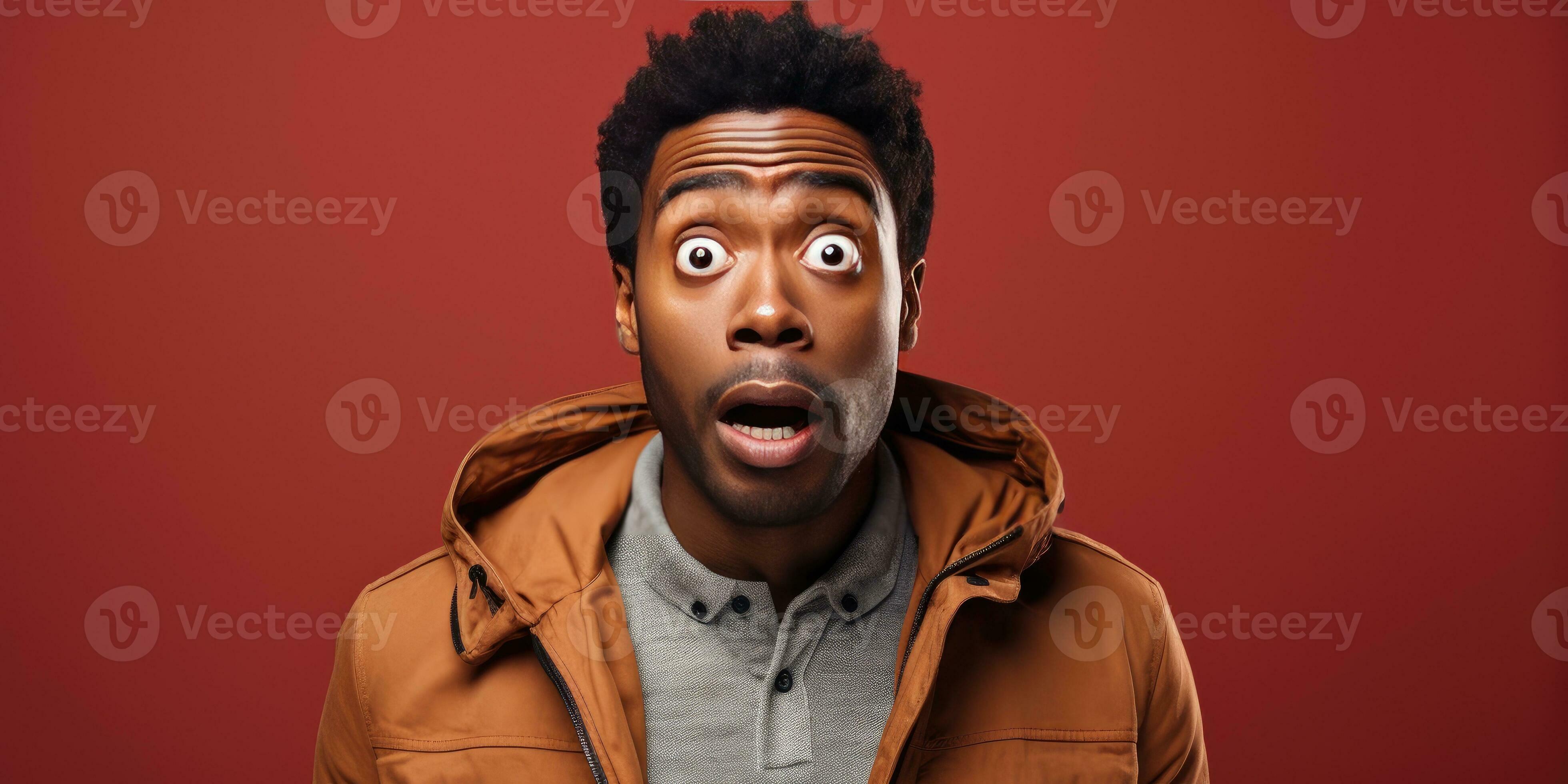 Surprised African man close-up on a red background. Generative AI