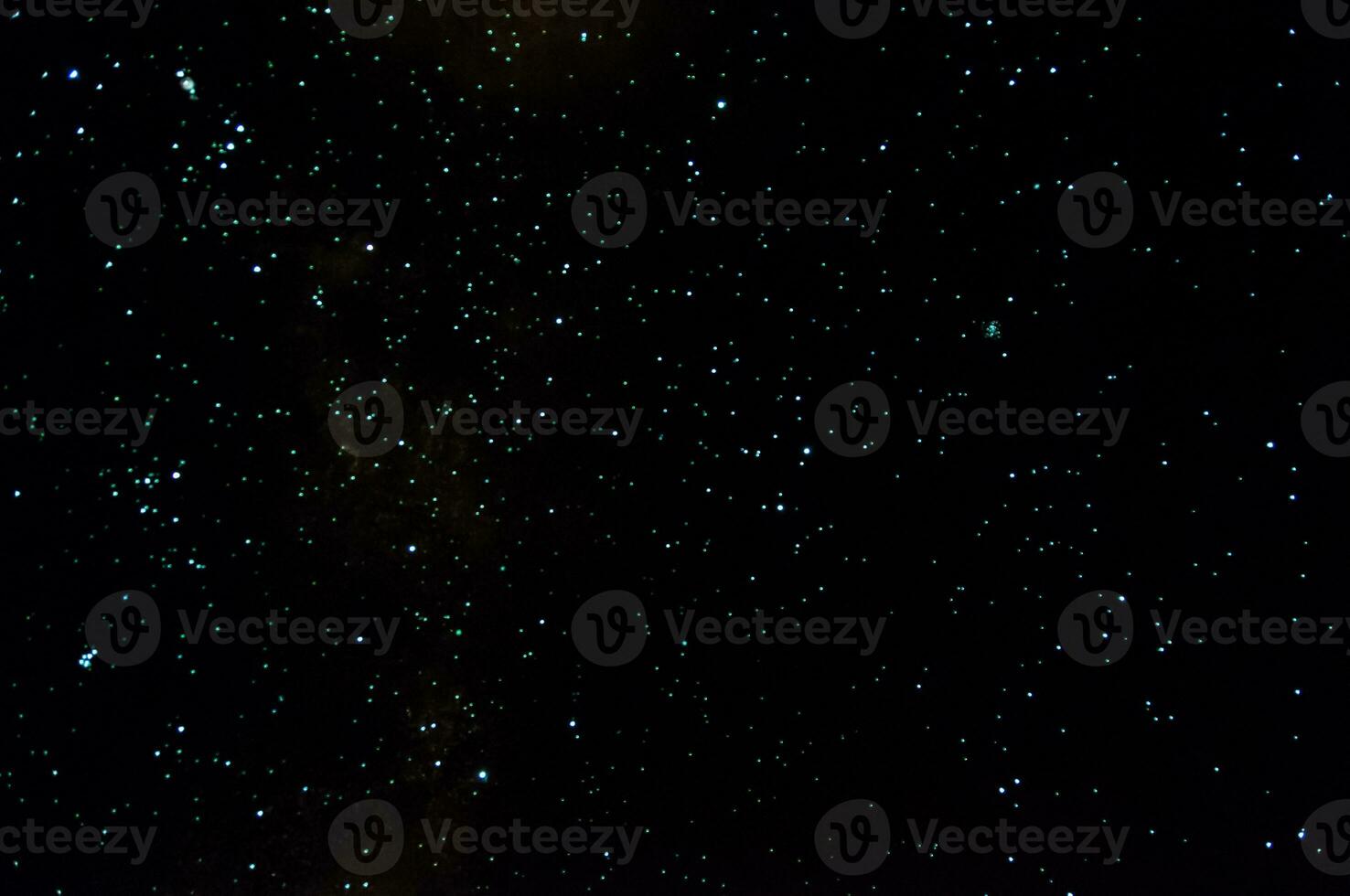 Long exposure of the sky seen at night with thousands of stars photo