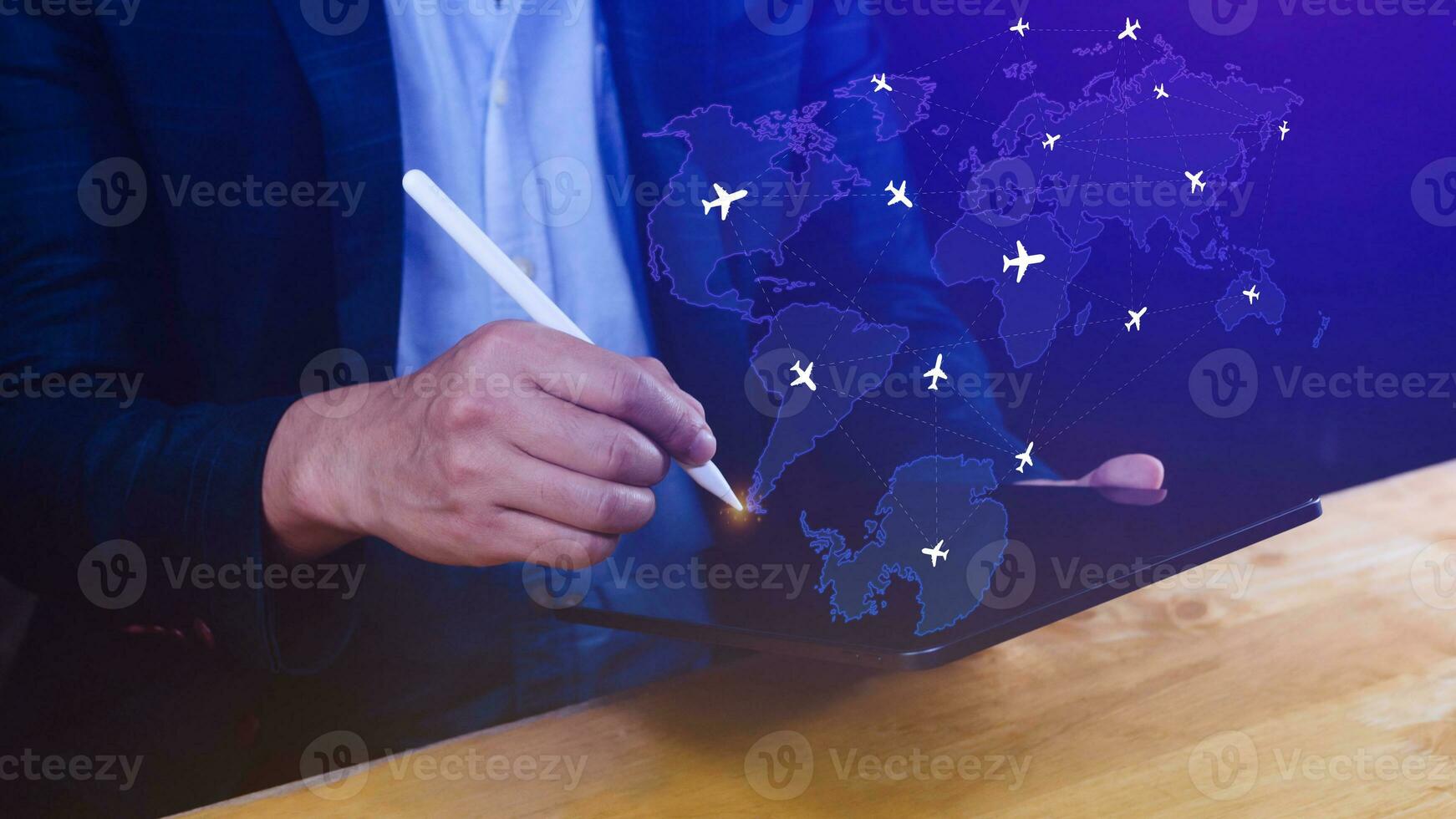 Businessman hand pushing flight booking networking, Hand pressing light blue world map with flight routes airplane, Transportation concept. photo