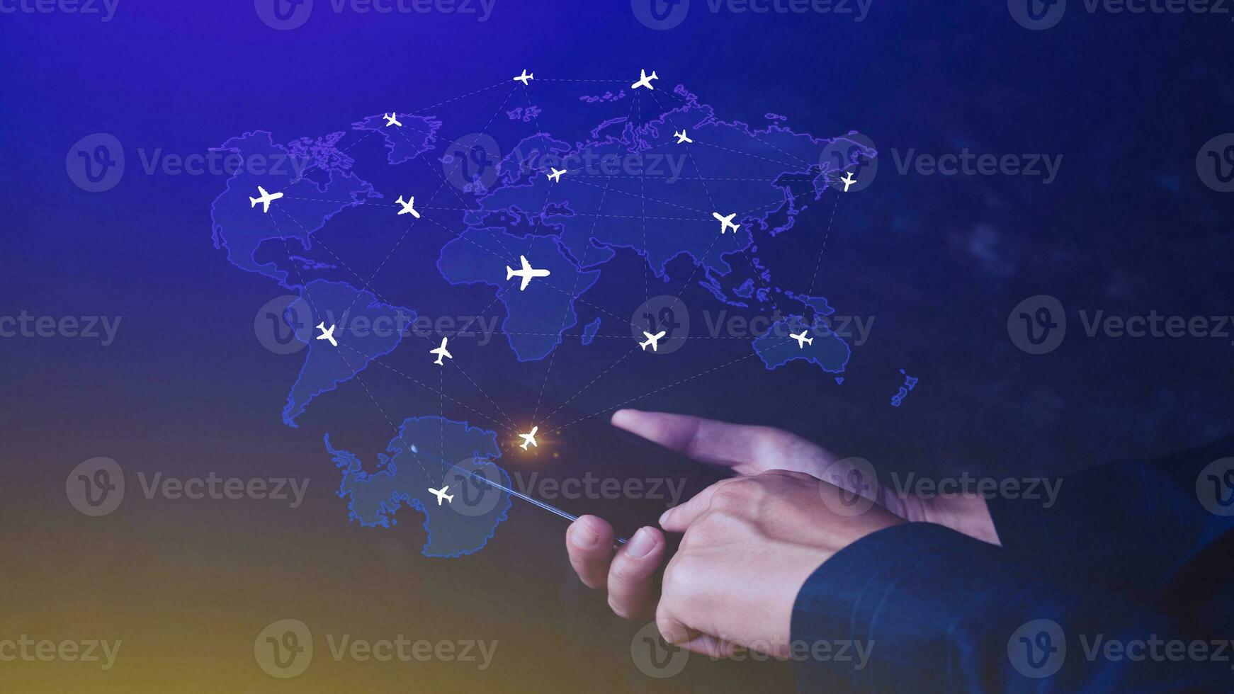 Businessman hand pushing flight booking networking with smart phone, Hand pressing light blue world map with flight routes airplane on blue background, Transportation concept. photo