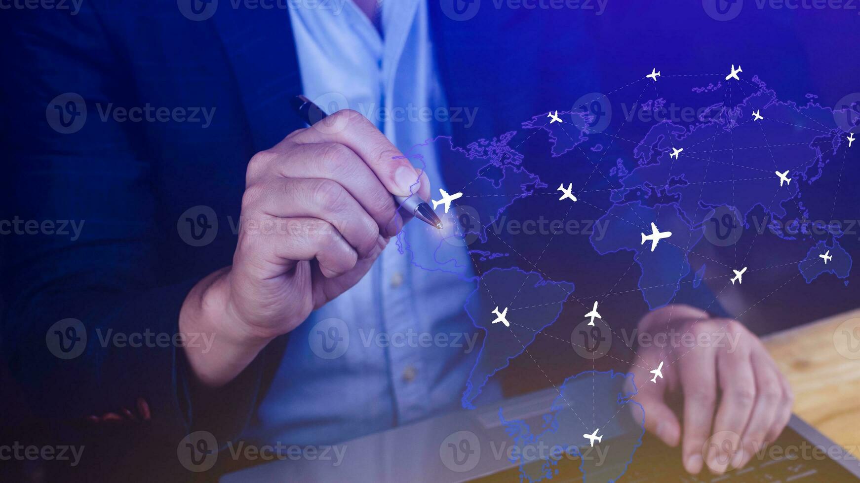 Businessman hand pushing flight booking networking, Hand pressing light blue world map with flight routes airplane, Transportation concept. photo