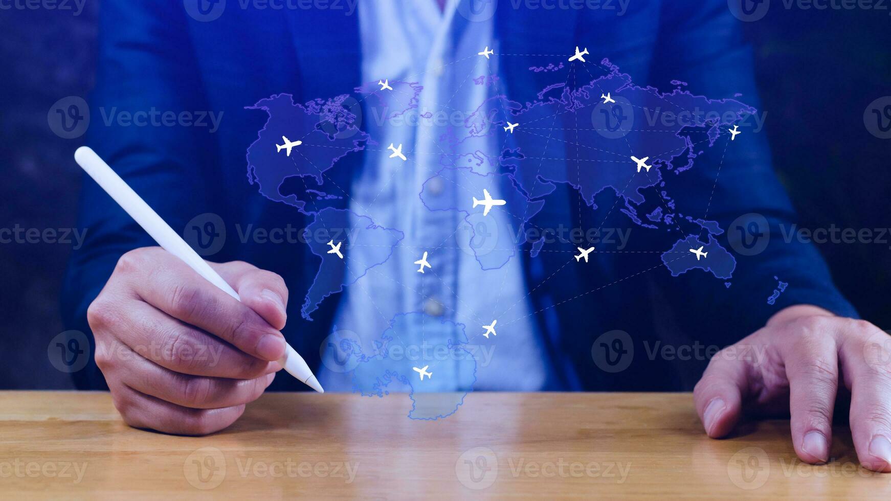 Businessman hand pushing flight booking networking, Hand pressing light blue world map with flight routes airplane, Transportation concept. photo
