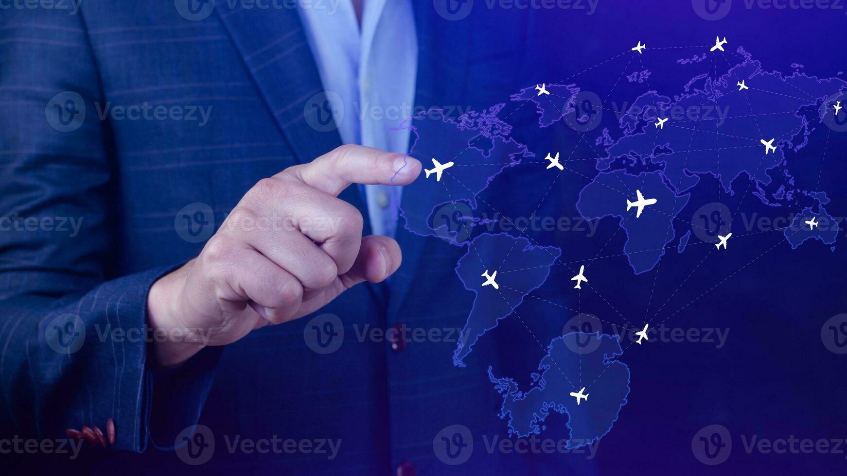 Businessman hand pushing flight booking networking, Hand pressing light blue world map with flight routes airplane, Transportation concept. photo
