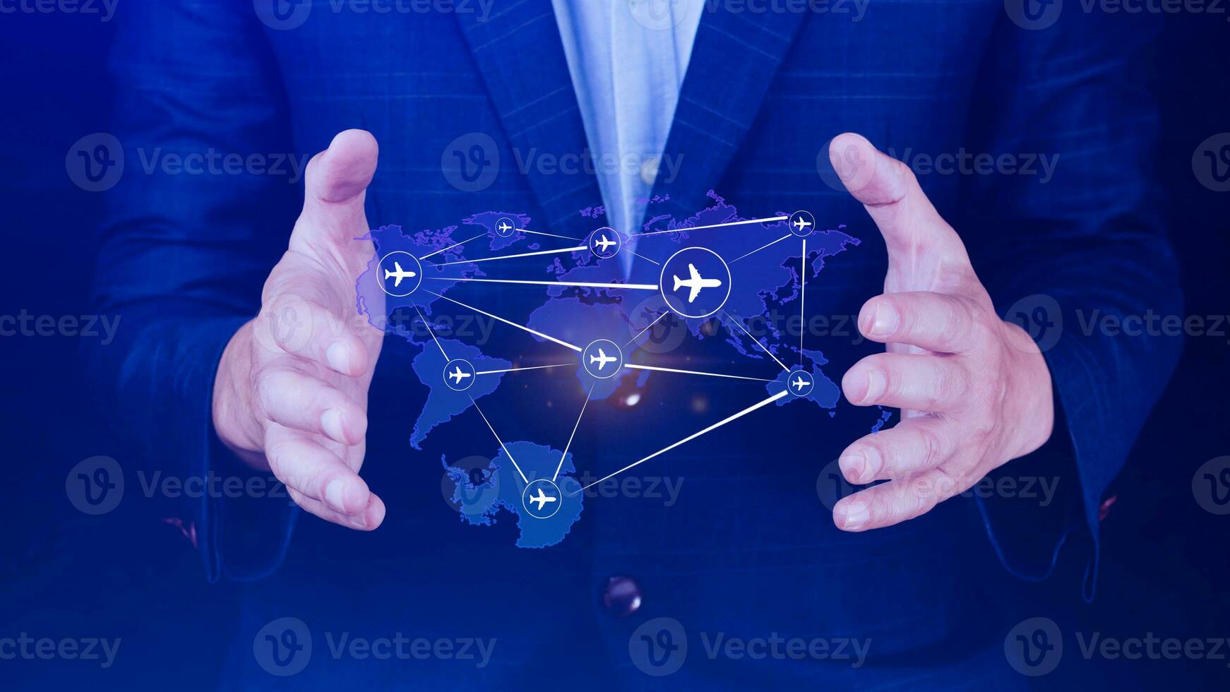 Businessman hand pushing flight booking networking, Hand pressing light blue world map with flight routes airplane, Transportation concept. photo
