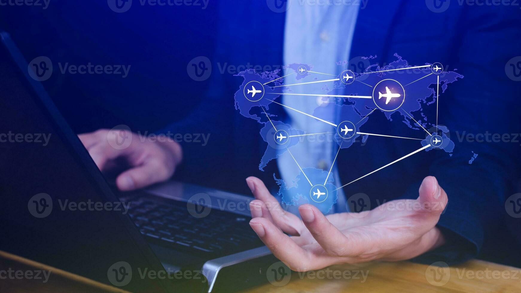 Businessman hand pushing flight booking networking, Hand pressing light blue world map with flight routes airplane, Transportation concept. photo