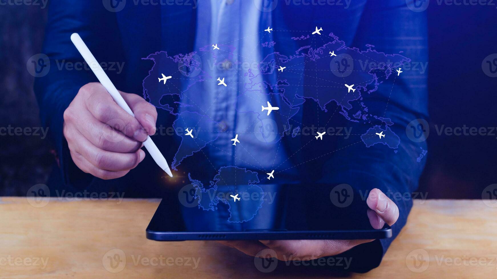 Businessman hand pushing flight booking networking, Hand pressing light blue world map with flight routes airplane, Transportation concept. photo