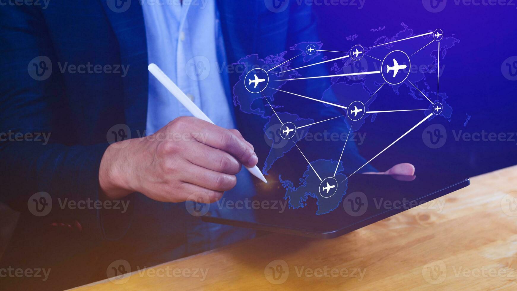 Businessman hand pushing flight booking networking, Hand pressing light blue world map with flight routes airplane, Transportation concept. photo