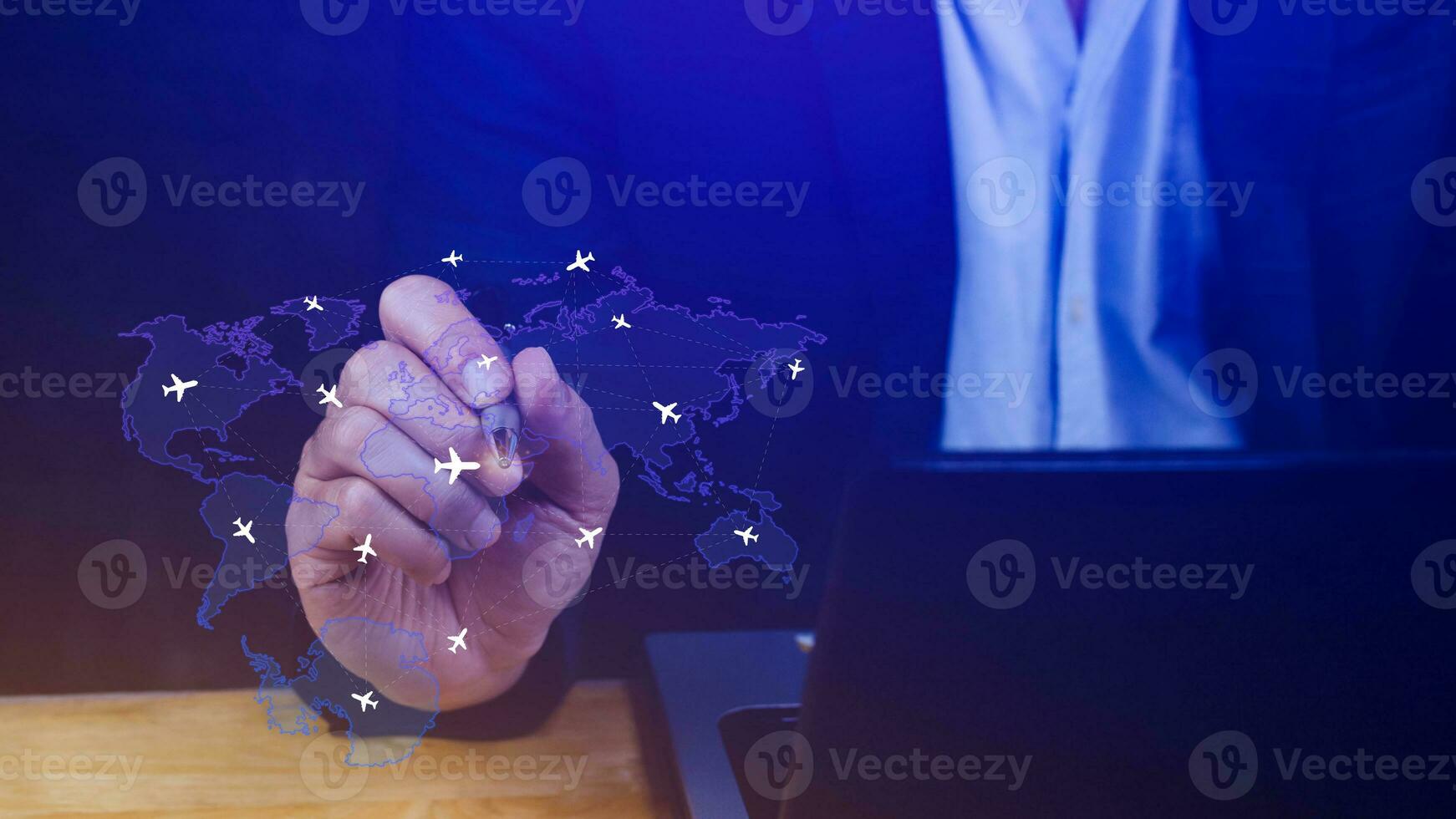Businessman hand pushing flight booking networking, Hand pressing light blue world map with flight routes airplane, Transportation concept. photo