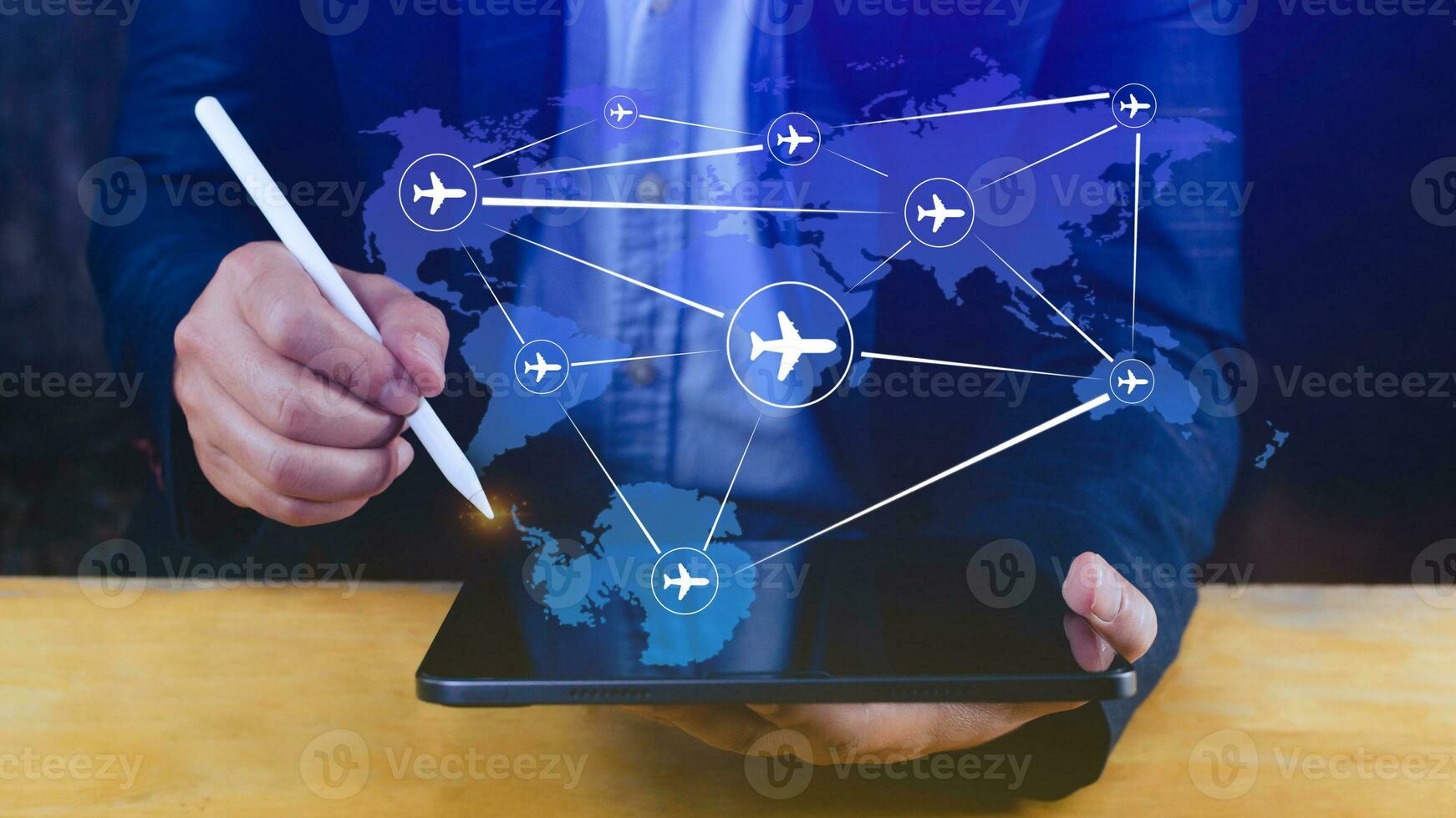 Businessman hand pushing flight booking networking, Hand pressing light blue world map with flight routes airplane, Transportation concept. photo