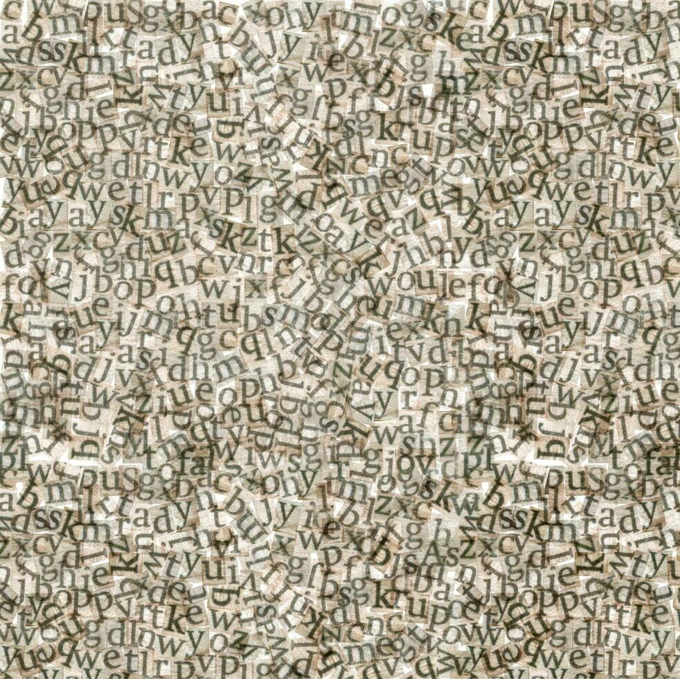 Background with aged newspaper's letters photo