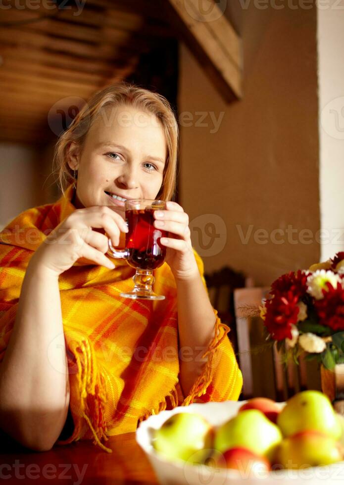 Young woman is drinking tea. photo