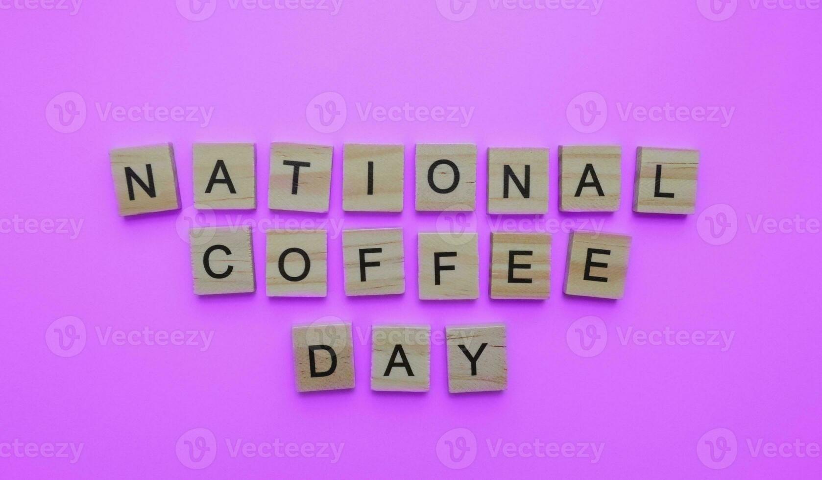 September 29, National coffee day, minimalistic banner with the inscription in wooden letters photo