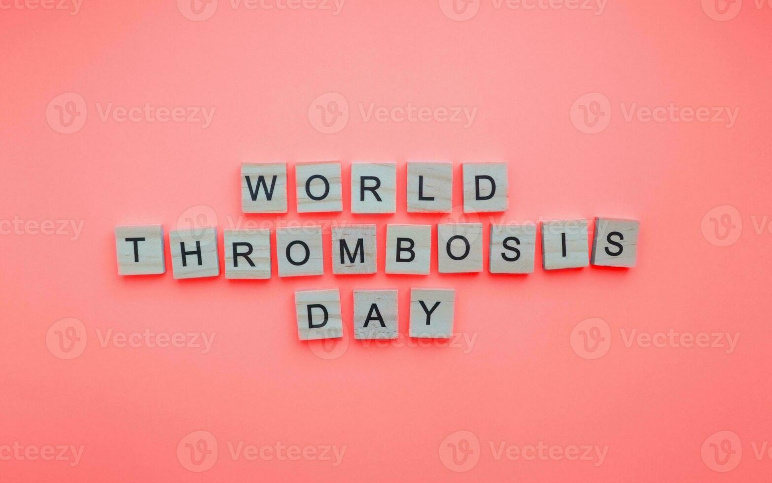 October 13, World Thrombosis Day, minimalistic banner with the inscription in wooden letters photo