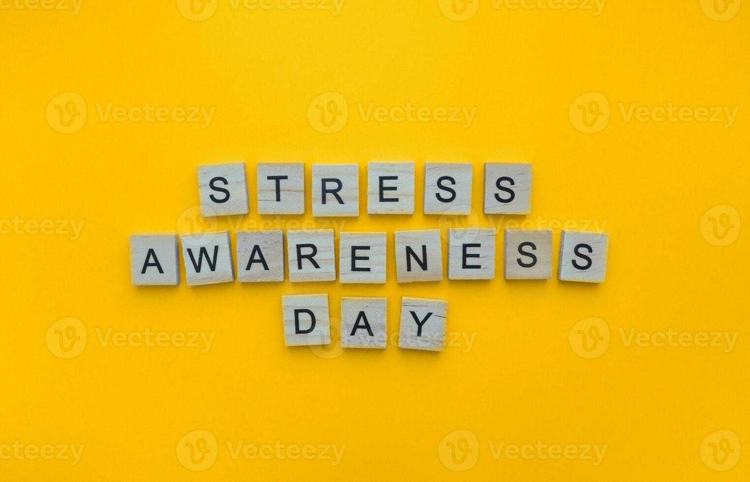 November 2, Stress Awareness Day, minimalistic banner with the inscription in wooden letters photo