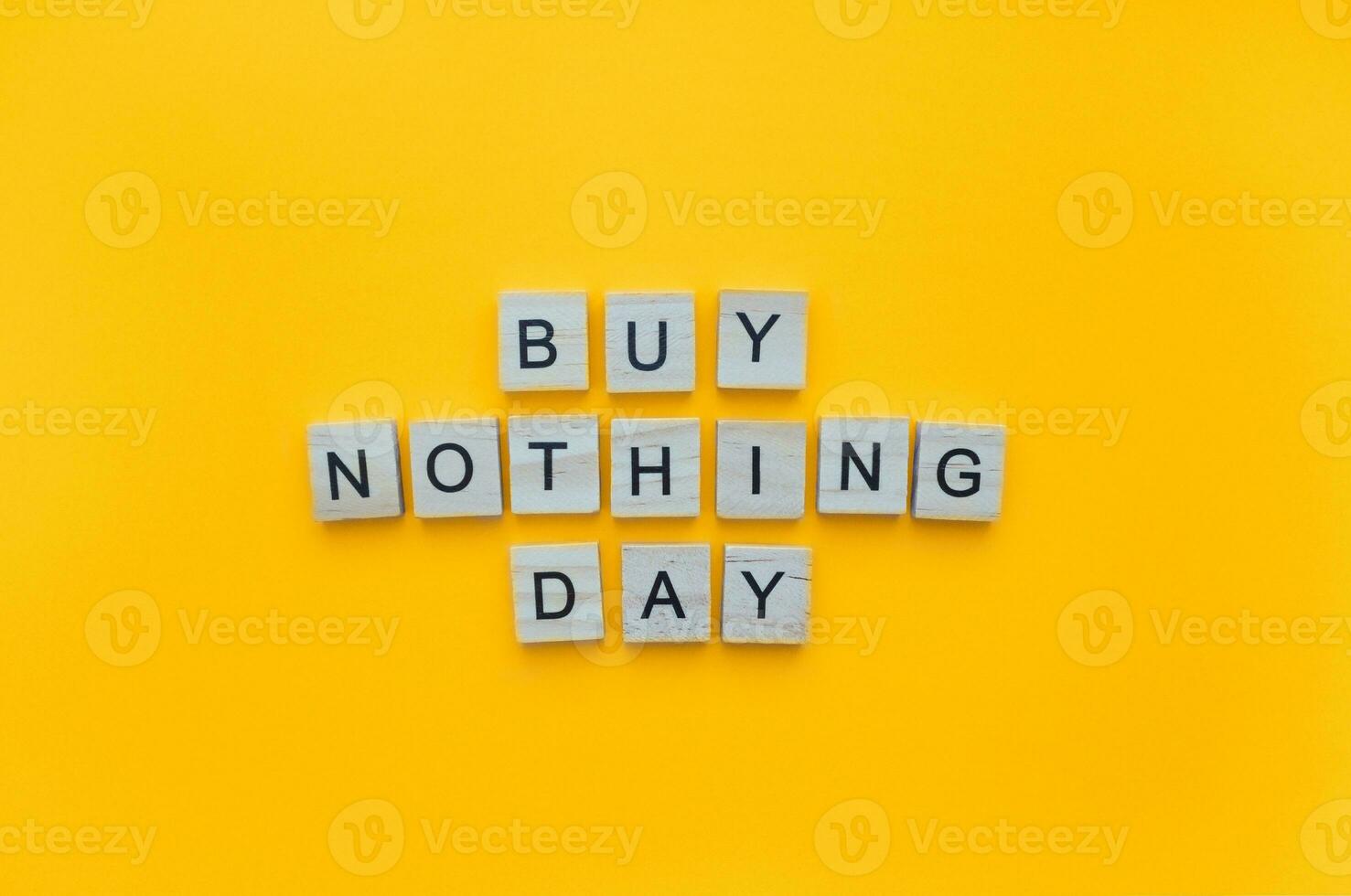November 25, Buy Nothing Day, minimalistic banner with the inscription in wooden letters photo