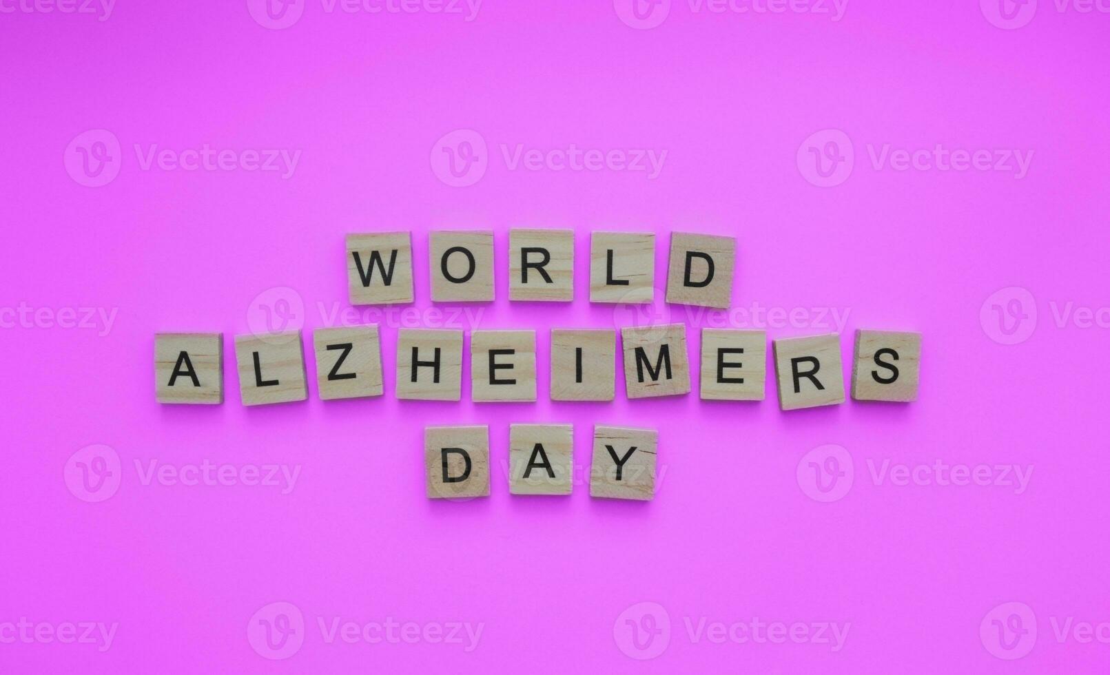 September 21, World Alzheimers Day, minimalistic banner with the inscription in wooden letters photo