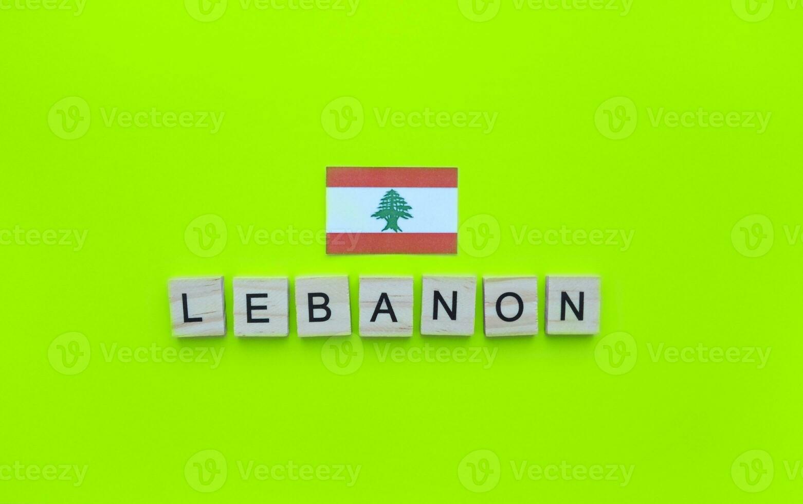 November 22, Lebanese Independence Day, the flag of Lebanon, a minimalistic banner with an inscription in wooden letters photo