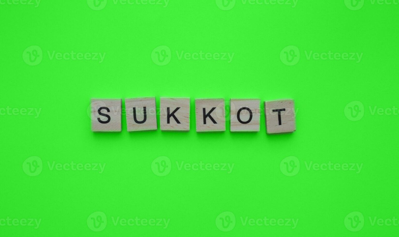 September 29 - October 6, Sukkot, a minimalistic banner with an inscription in wooden letters photo
