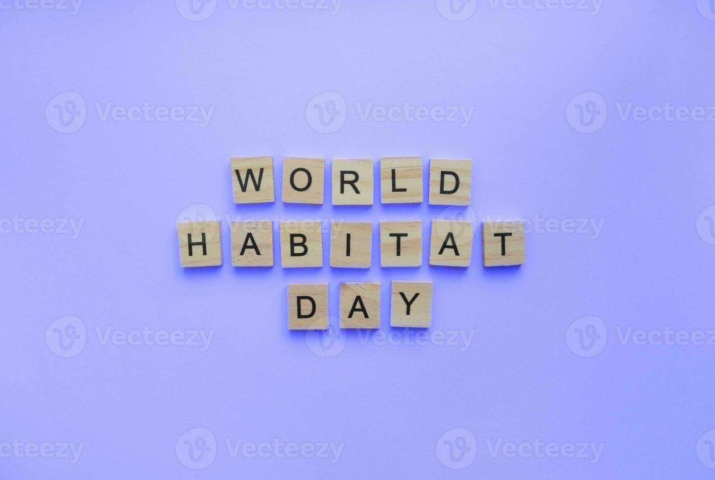 October 2, World Habitat Day, minimalistic banner with the inscription in wooden letters photo