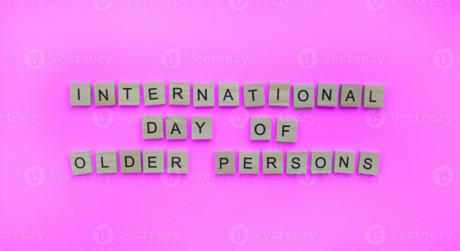 October 1, International Day of Older Persons, minimalistic banner with the inscription in wooden letters photo