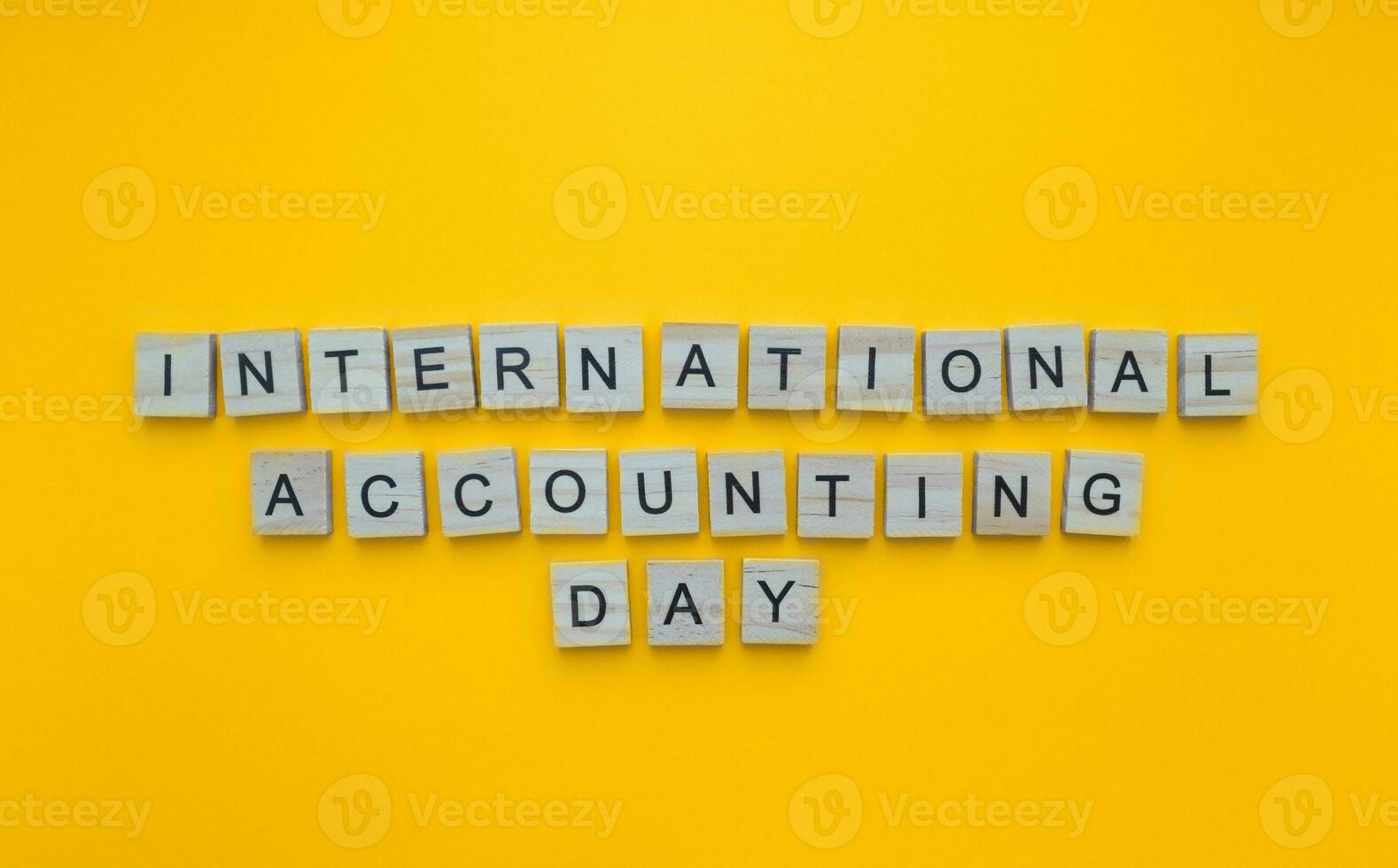 November 10, International Accounting Day, Accountants Day, minimalistic banner with the inscription in wooden letters photo