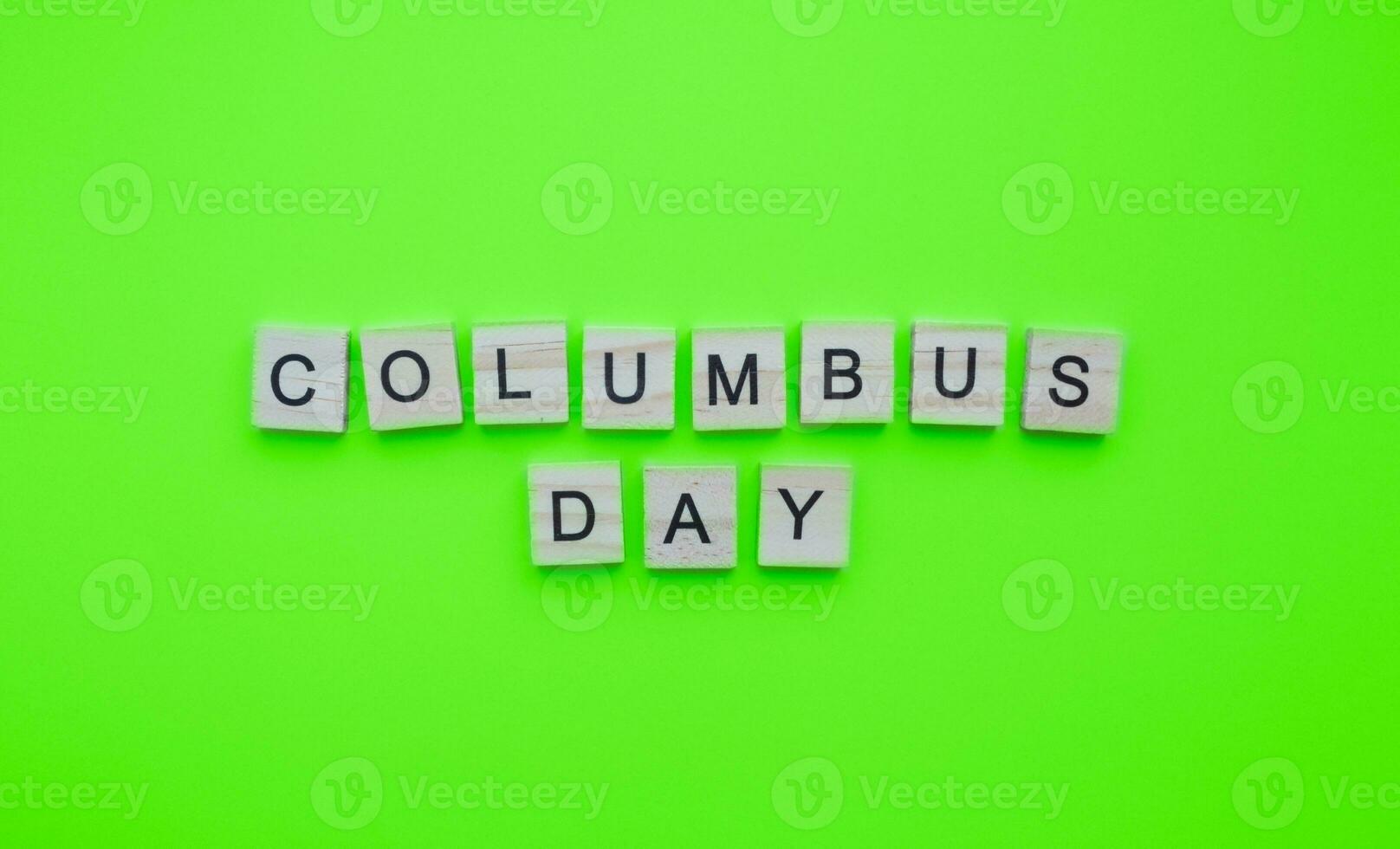 October 9, Columbus Day, minimalistic banner with the inscription in wooden letters photo