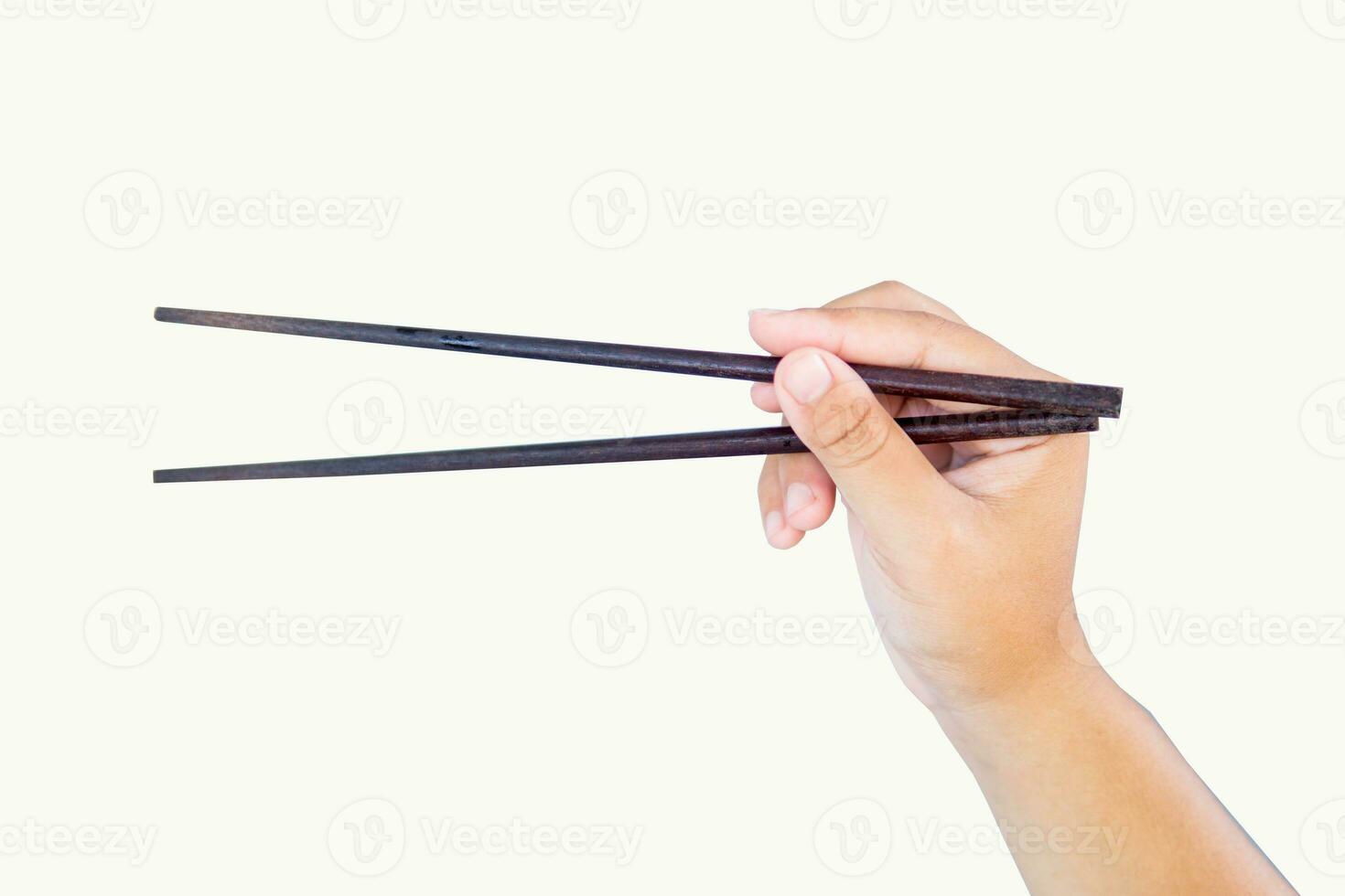 hands holding chopsticks white background photo