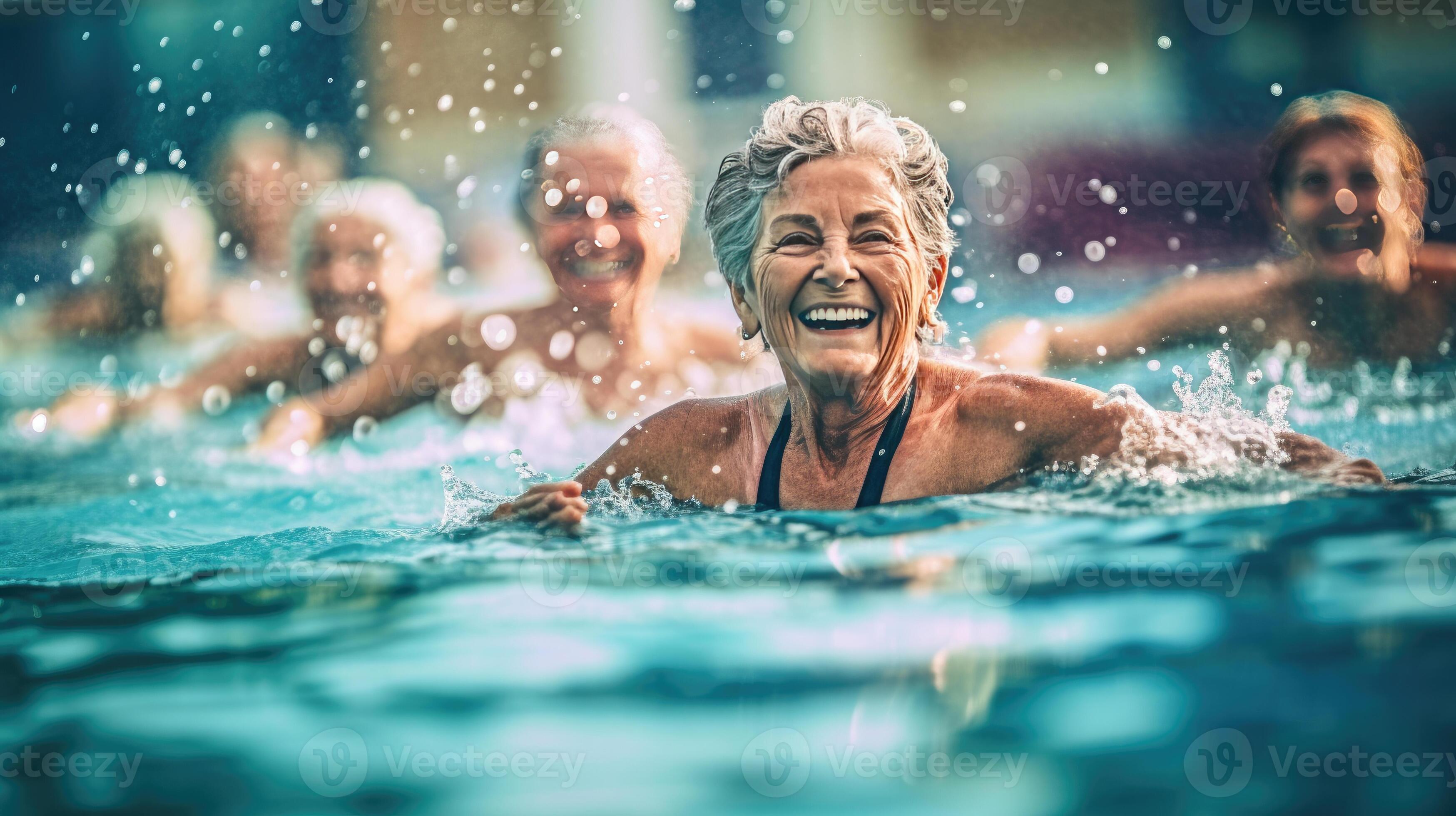 Exercise in water, Active senior women enjoying aqua fit class in a
