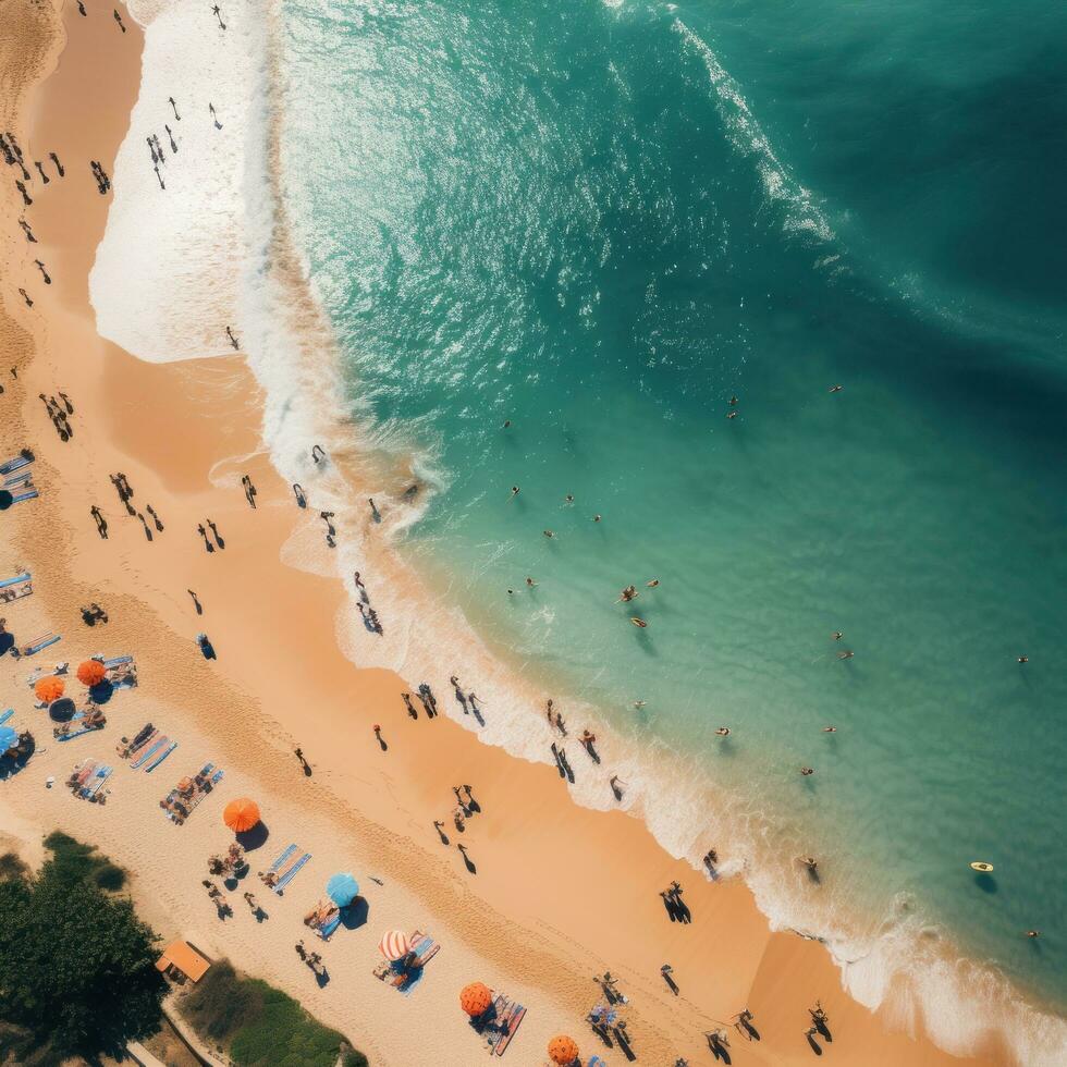 Aerial shot of a crowded beach with swimmers enjoying the waves photo