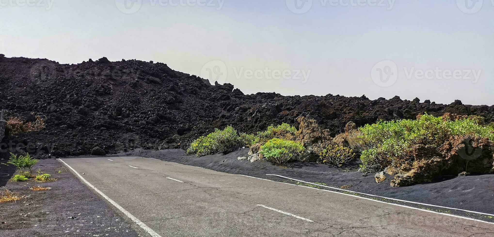 Solidified volcanic lava stream from the Cumbre Vieja volcano on the island of La Palma photo