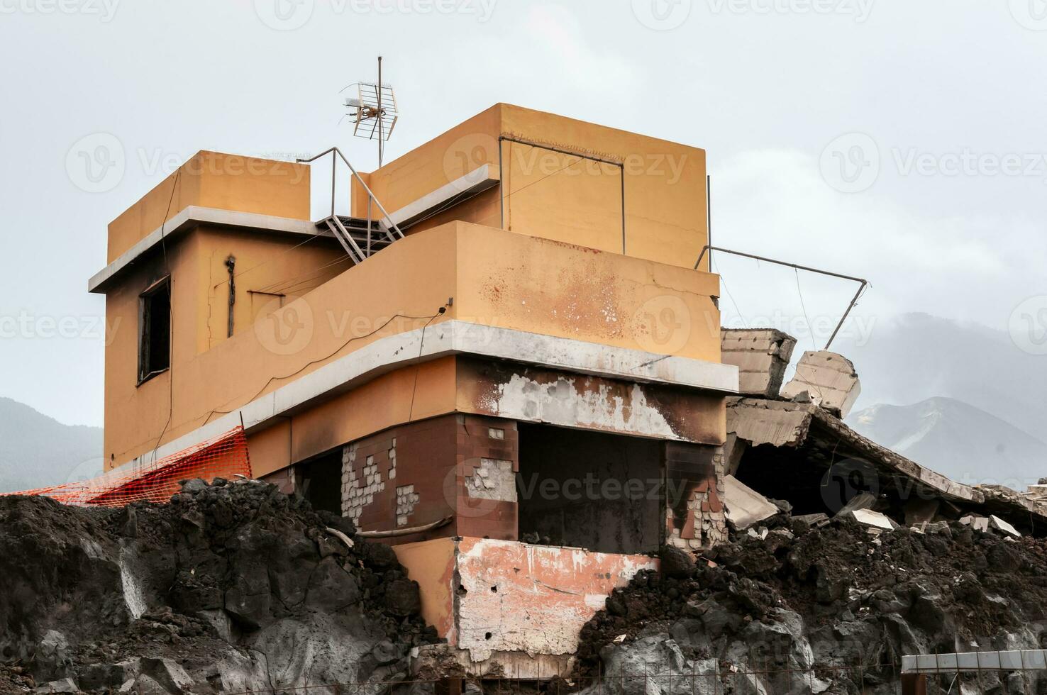 Building destroyed by the volcanic lava flow from the Cumbre Vieja volcano, on the island of La Palma photo