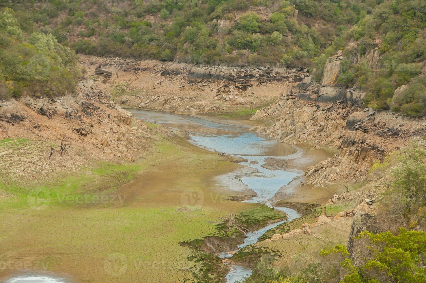 The Ponsul River is a affluent of the Tejo River, in Portugal, and is a very large river. At this time it is completely dry, without water and with its bed cracked due to climate change photo