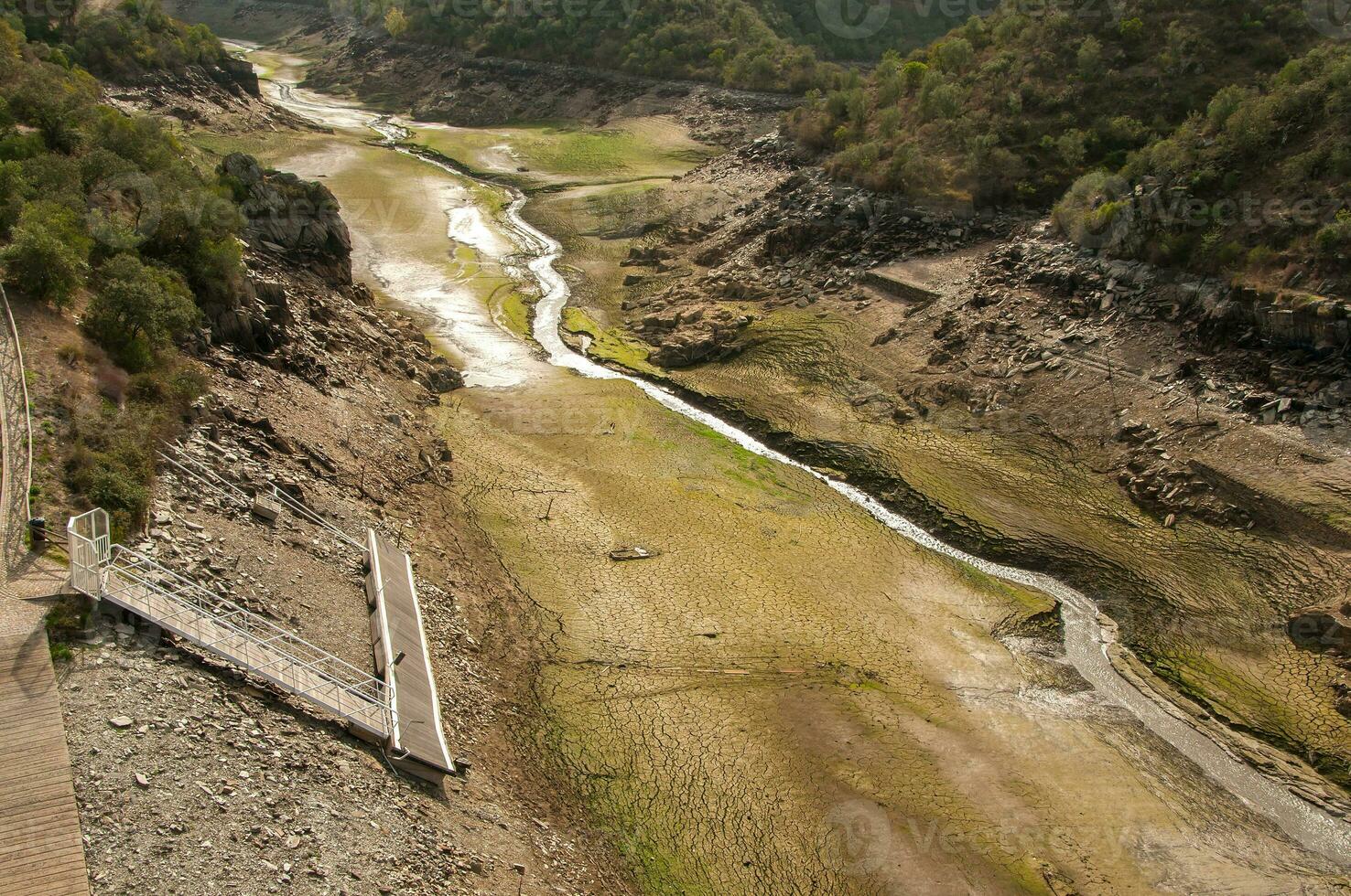 The Ponsul River is a affluent of the Tejo River, in Portugal, and is a very large river. At this time it is completely dry, without water and with its bed cracked due to climate change photo