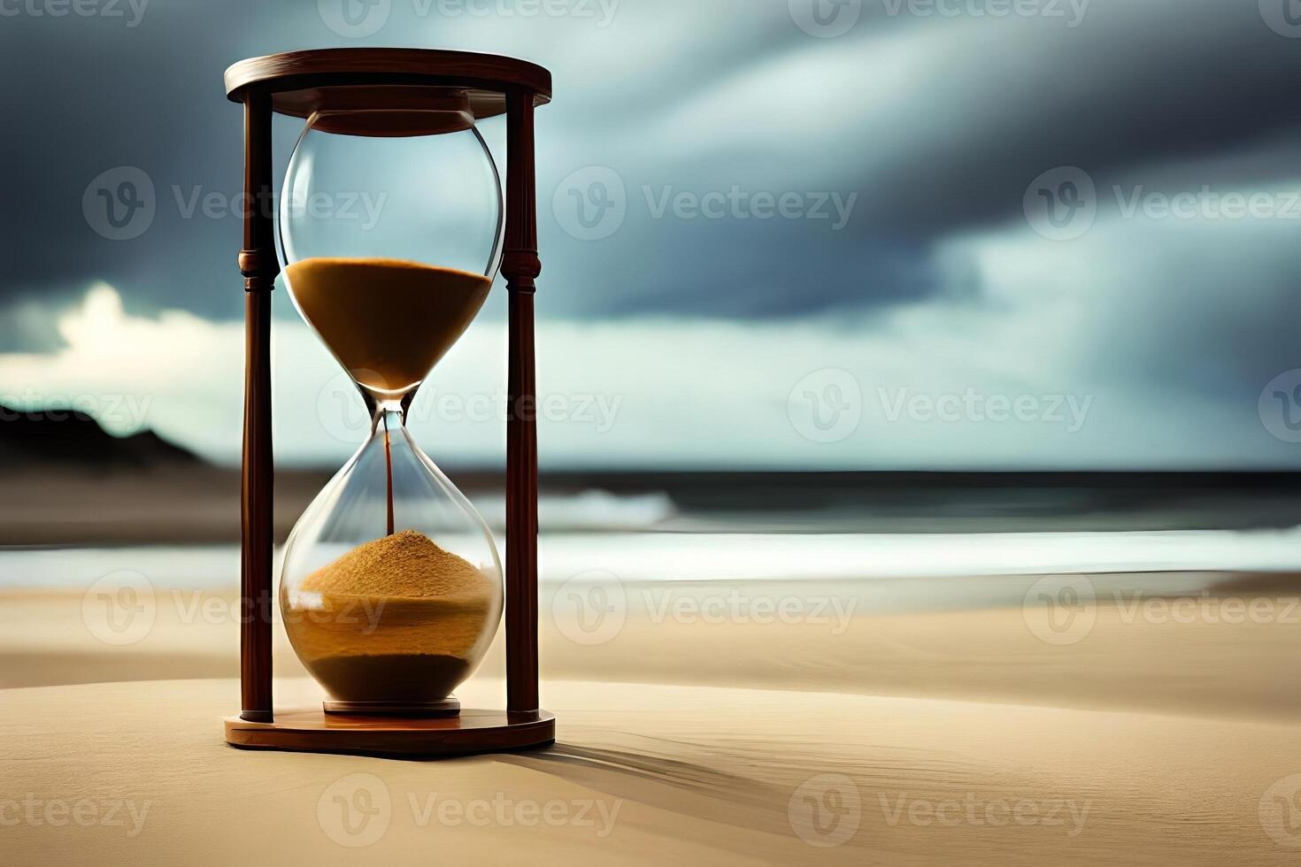 Show off an hourglass with the ultimate grains of sand falling, inferring the conclusion of one year and the graduation of another. photo
