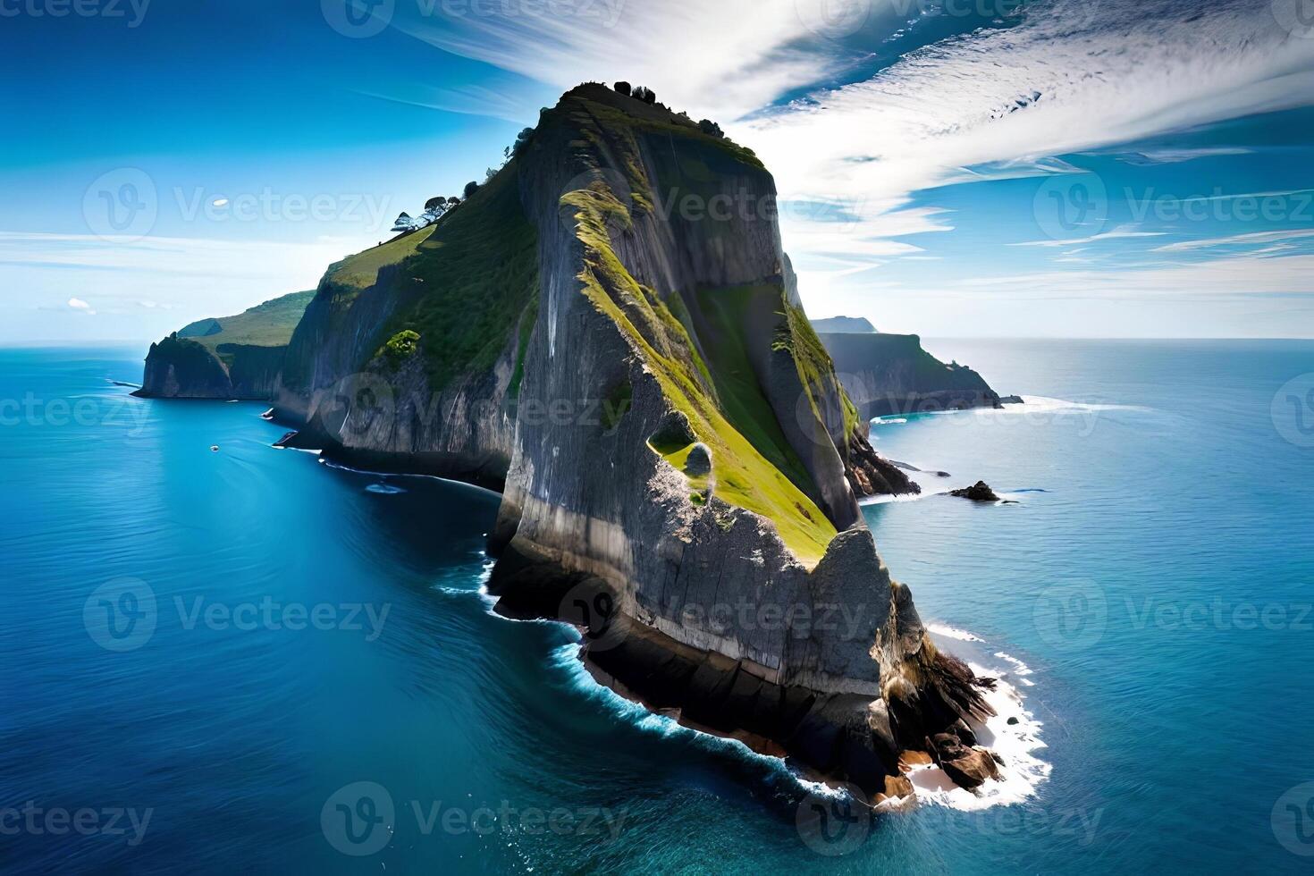 A breathtaking airborne see of overwhelming coastal cliffs get together the essential blue sea. photo
