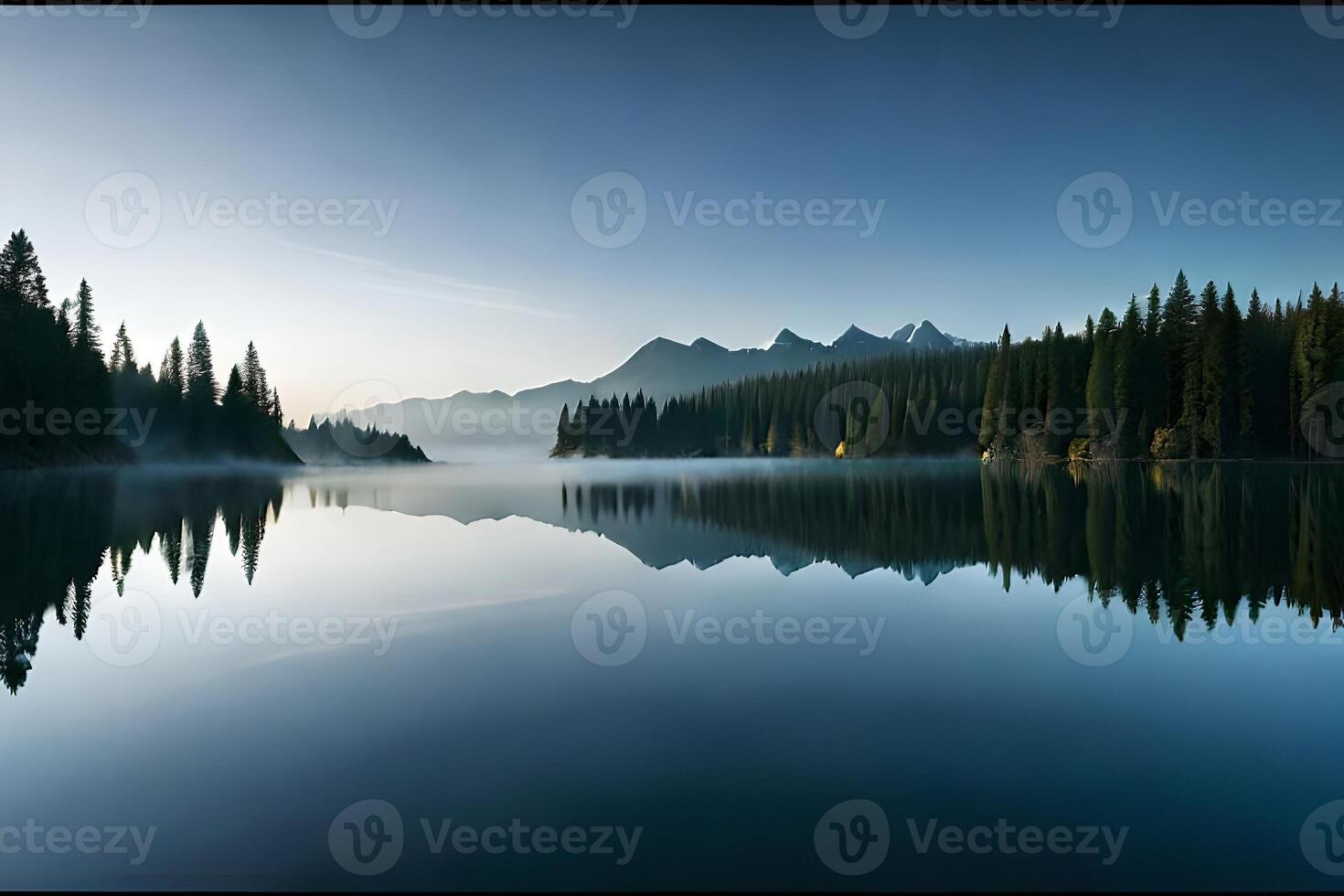 A cloudiness secured mountain lake with evergreen trees reflected on its sparkly surface. photo