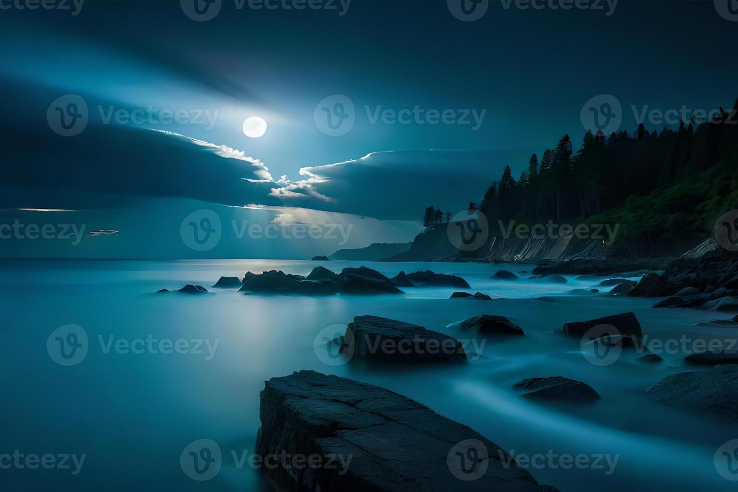 The tranquil and charmed scene of moonlight reflecting on delicate ocean waves. photo