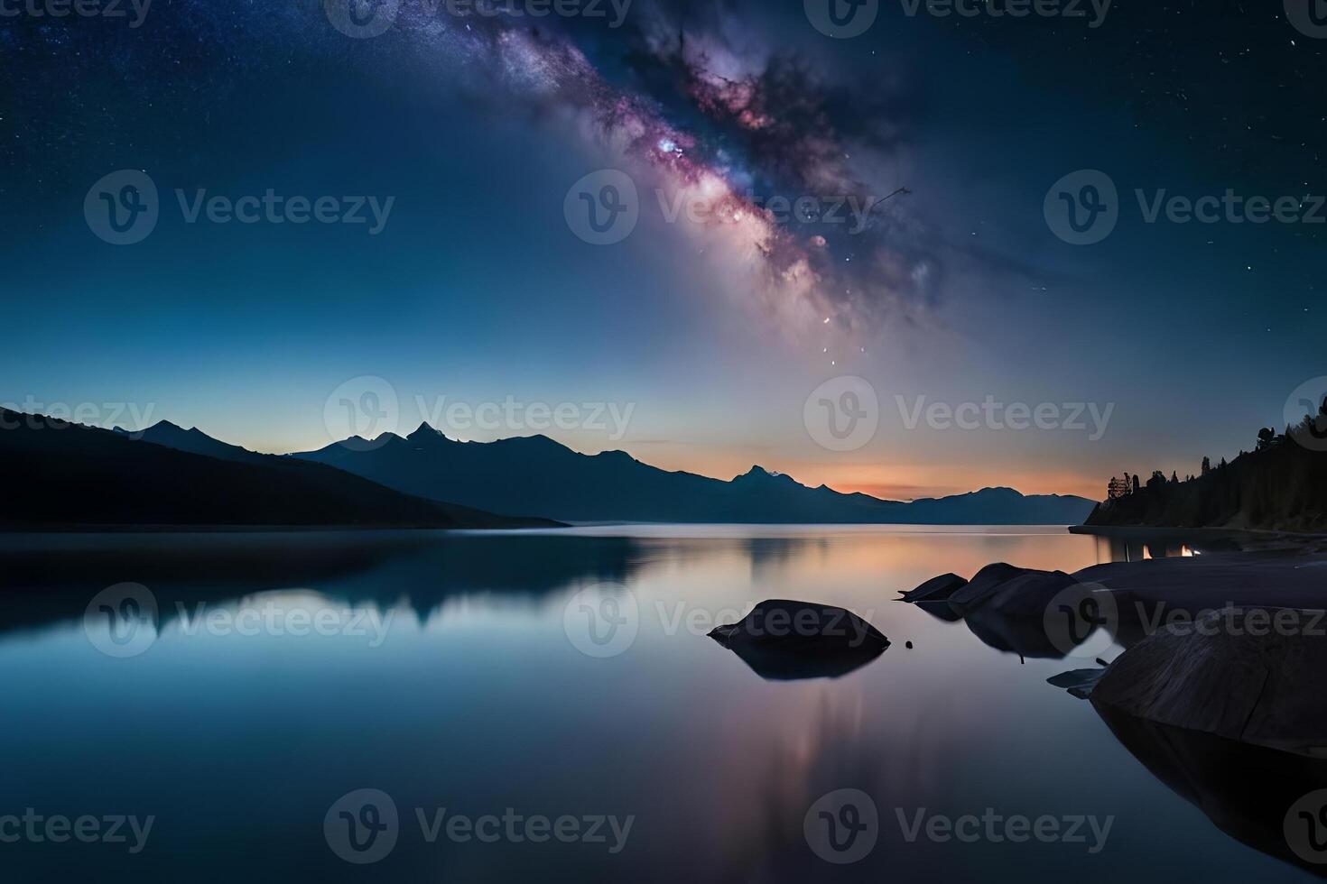 A mesmerizing night sky over a calm lake, reflecting the stars and the Smooth Way. photo