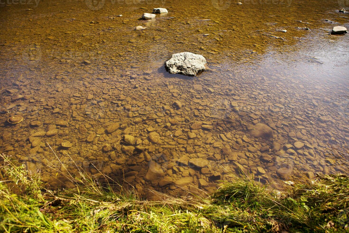 the river in the Carpathians, all in the rocks is clean and very clear water, the top view photo