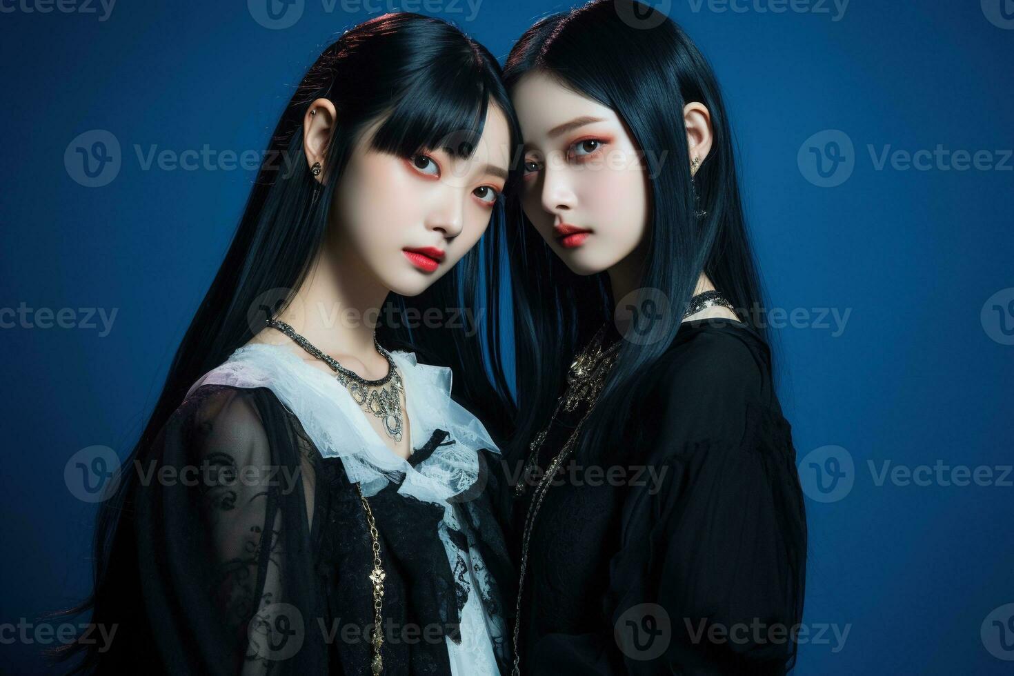 Portrait of two beautiful asian women in Fashion outfits on blue background AI Generated photo