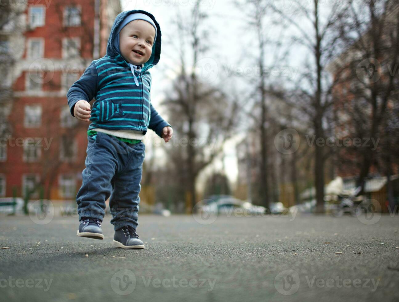 A happy baby is walking photo