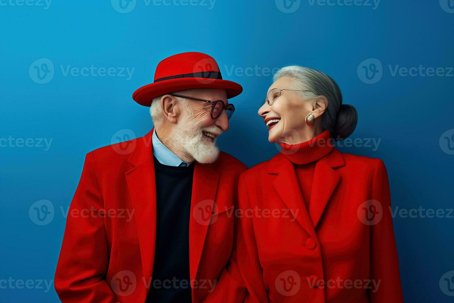 Stylishly dressed elderly woman and man in a positive mood on a colorful background photo