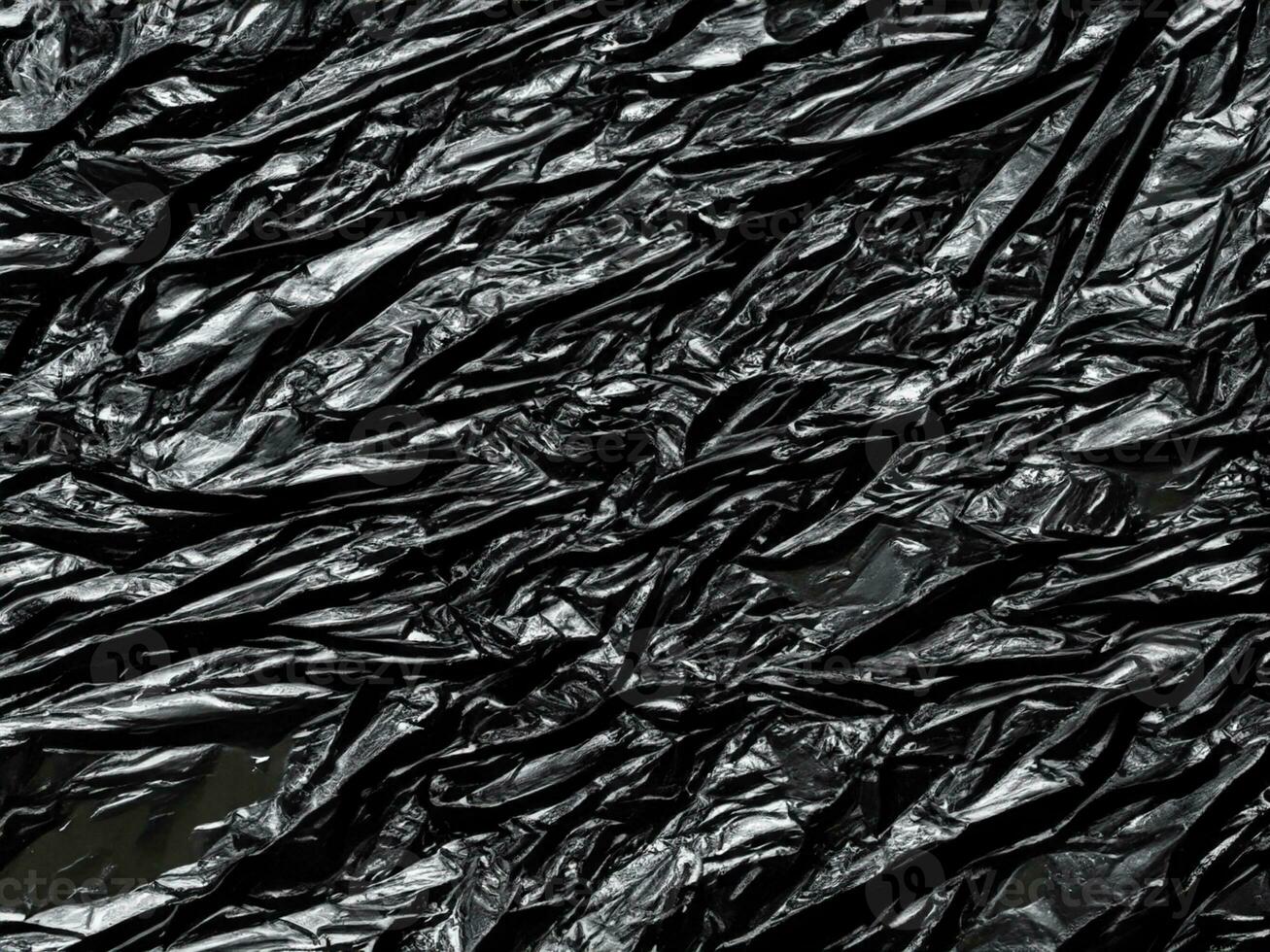 black plastic bag background. texture. black plastic background. photo