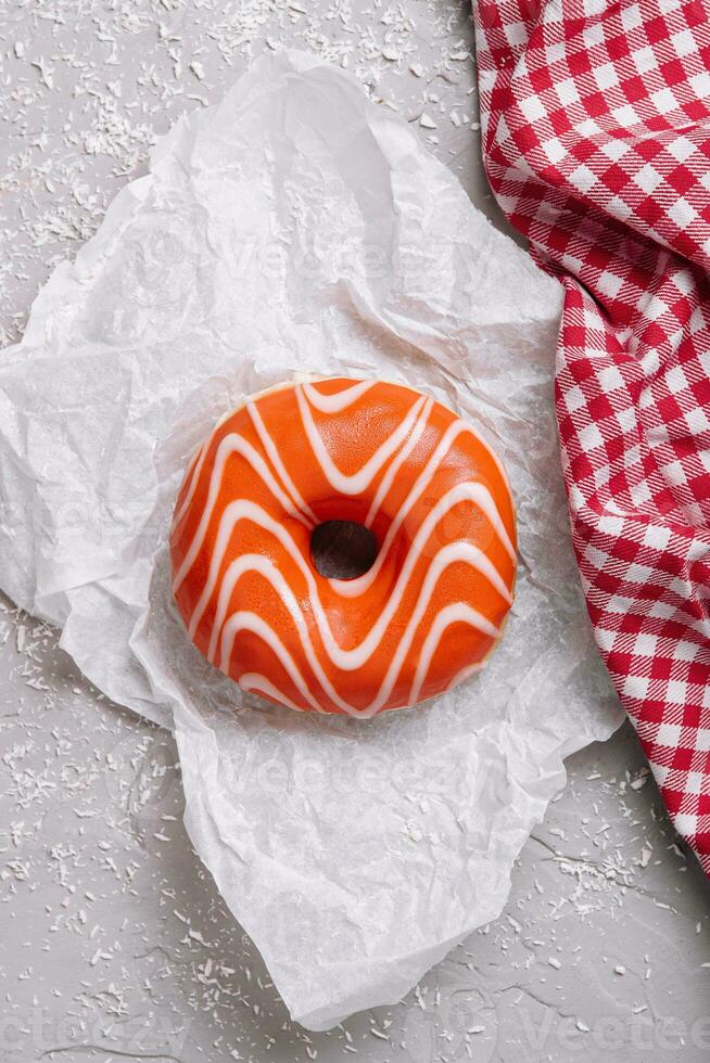 Watercolor orange donut. top view. photo